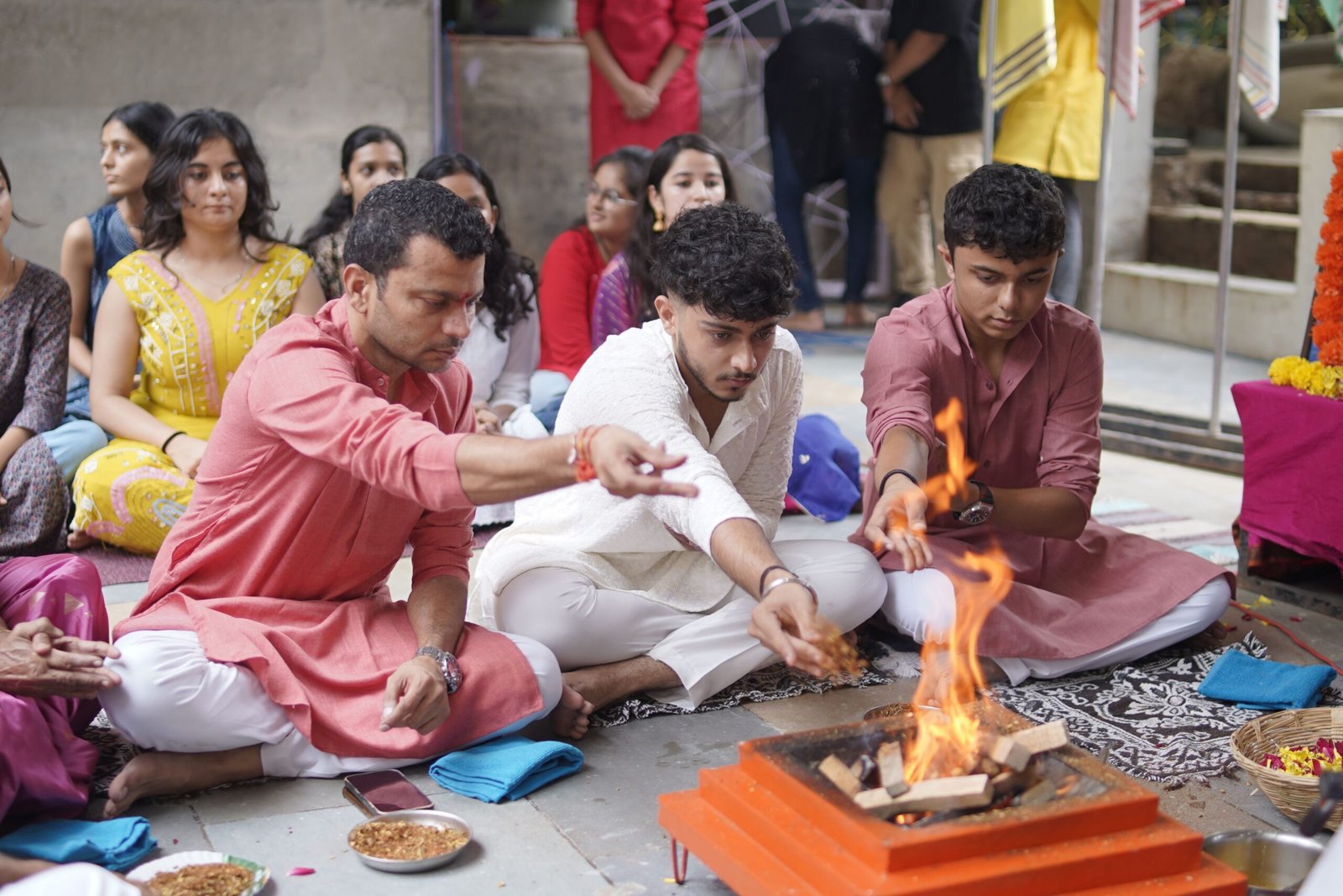 Participants Performing Sacred Havan Ritual Fire Ceremony Outdoors